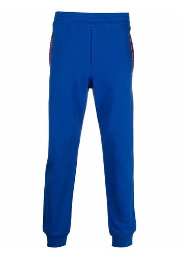 Alexander McQueen logo-tape detail track pants - Blu