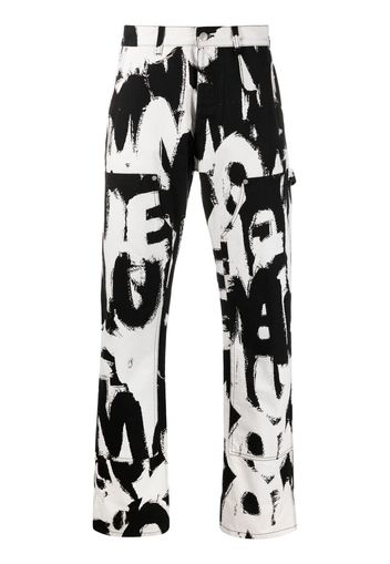 Alexander McQueen Jeans dritti con stampa graffiti - Bianco