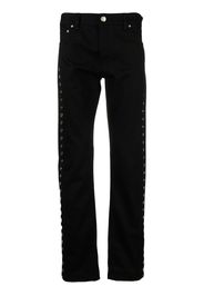 Alexander McQueen metal-eyelet detail jeans - Nero