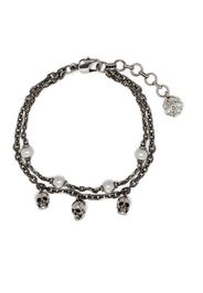 Alexander McQueen layered skull charm bracelet - Argento