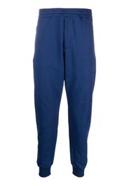 Alexander McQueen logo-print track pants - Blu