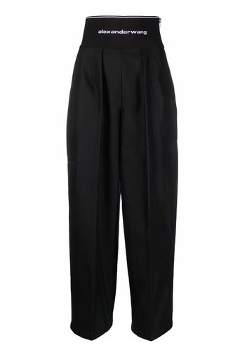 Alexander Wang logo-waist pressed-crease trousers - Nero