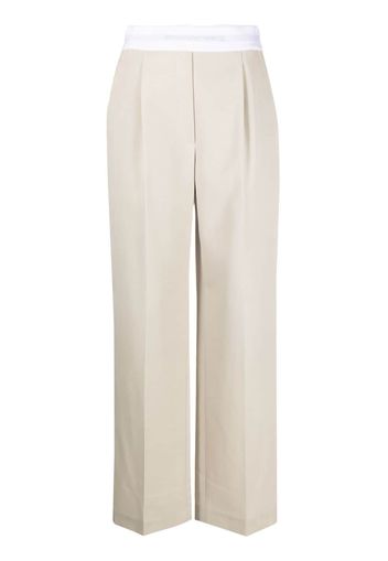 Alexander Wang logo-waistband straight-leg trousers - Toni neutri