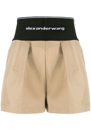 Alexander Wang logo-waist pleated shorts - Toni neutri