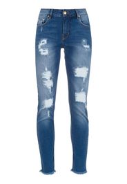 Jeans skinny con effetto vissuto