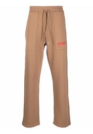 AMBUSH logo-print track pants - Toni neutri