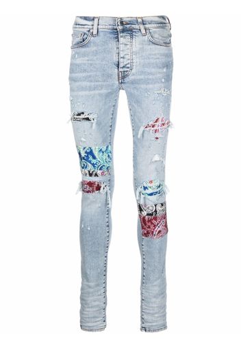 AMIRI distressed skinny jeans - Blu