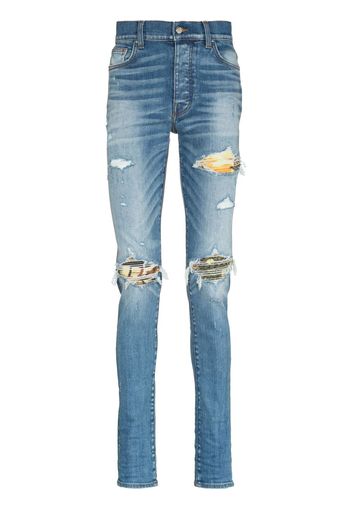 AMIRI distressed skinny jeans - Blu