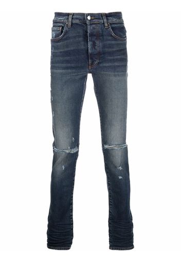 AMIRI faded-effect skinny jeans - Blu