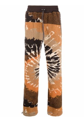 AMIRI Pantaloni con fantasia tie-dye - Arancione