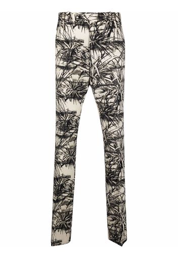 AMIRI graphic-print flared trousers - Toni neutri