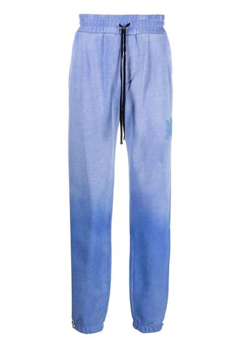 AMIRI faded jersey track pants - Blu