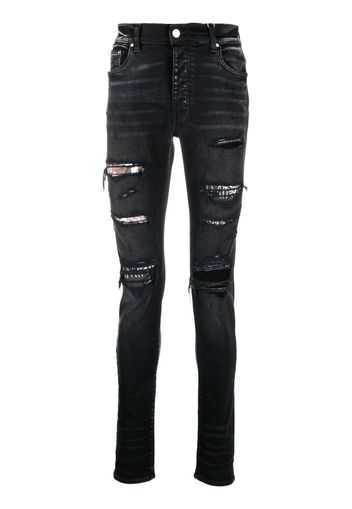 AMIRI Jeans slim con effetto vissuto - Nero