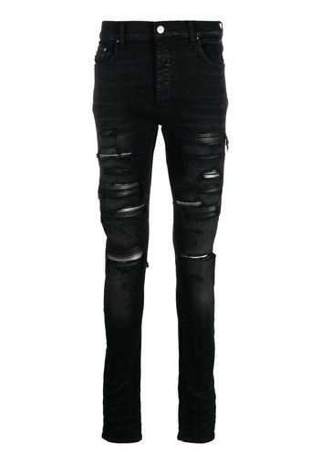 AMIRI Jeans skinny Thrasher con effetto vissuto - Nero