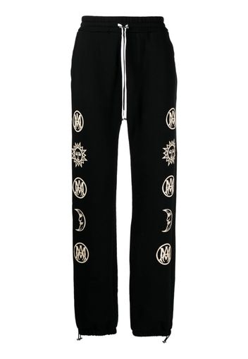 AMIRI graphic-print trousers - Nero