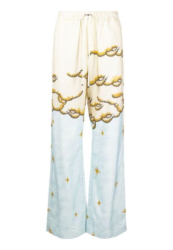 AMIRI Sunscape-print flared trousers - Giallo