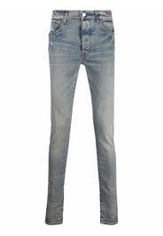 AMIRI washed-effect skinny jeans - Blu