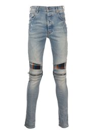 AMIRI mid-rise contrasting-panel skinny jeans - Arancione