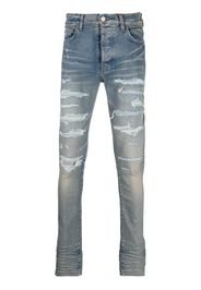 AMIRI distressed-effect skinny jeans - Blu