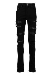 AMIRI Jeans con decorazione Thrasher - Nero