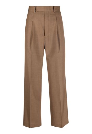 Auralee pressed-crease tailored trousers - Marrone