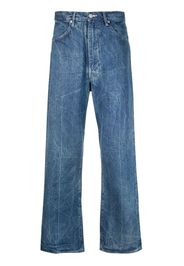 Auralee crinkled-finish flared-leg jeans - Blu