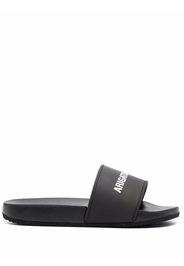 Axel Arigato logo-print slides - Nero