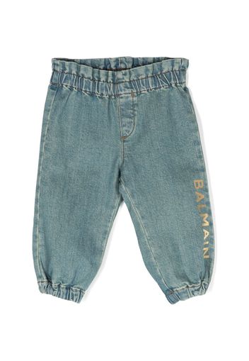 Balmain Kids logo-print elasticated tapered jeans - Blu