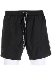 Balmain layered logo-tape shorts - Nero