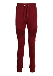 Balmain Pantaloni sportivi con stampa - Rosso