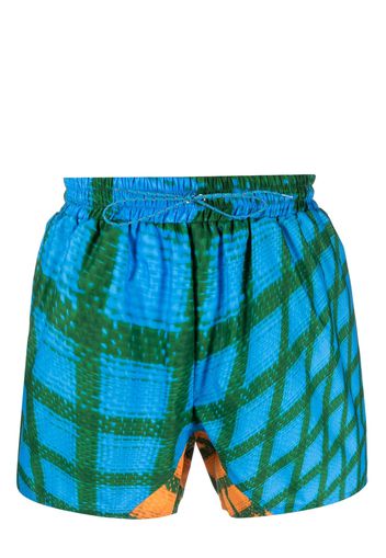 Bianca Saunders Wosh warped-pattern swim shorts - Blu