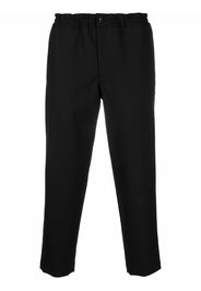 Black Comme Des Garçons flap-pocket wool trousers - Nero