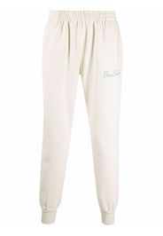 BLUE SKY INN logo-embroidered cotton track pants - Toni neutri