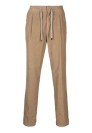 Brunello Cucinelli tapered-leg corduroy trousers - Toni neutri