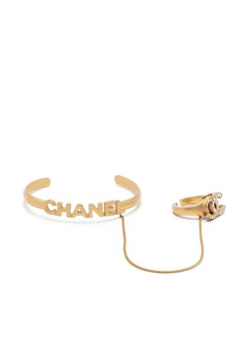 Chanel Pre-Owned Bracciale rigido con strass CC Pre-owned 2001 - Oro