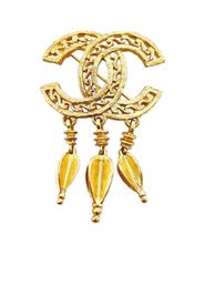 CHANEL Pre-Owned CC bead-embellished brooch - Oro