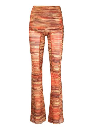 Charlotte Knowles Hard Stripes-print flared trousers - Arancione