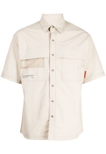 CHOCOOLATE logo-print short-sleeve shirt - Toni neutri