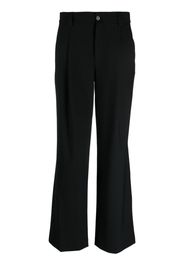 Closed high-waisted flared trousers - Nero