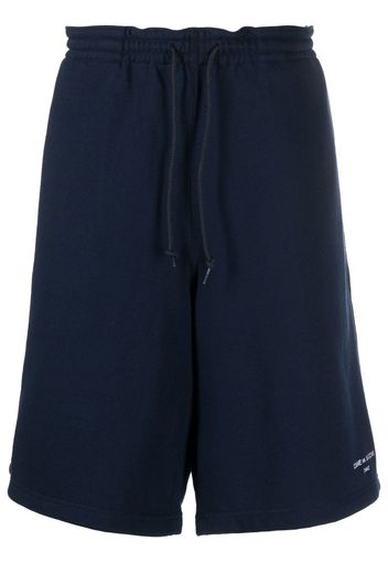 Comme Des Garçons Homme Bermuda con stampa - Blu