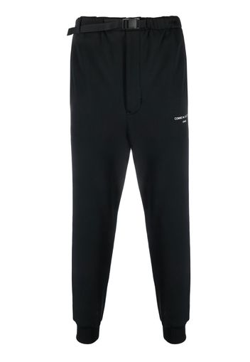 Comme Des Garçons Homme Pantaloni sportivi affusolati con ricamo - Nero