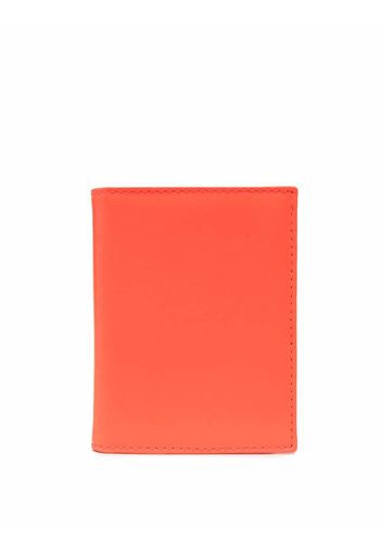 Comme Des Garçons Wallet Super Fluorescent bi-fold mini leather wallet - Arancione