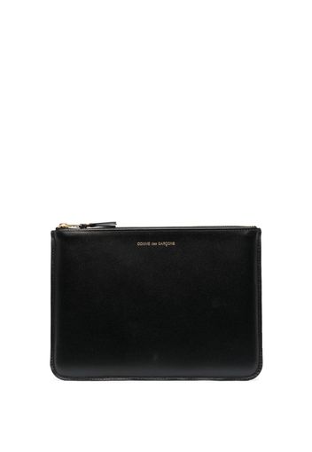 Comme Des Garçons Wallet Portafoglio con logo inciso in pelle - Nero