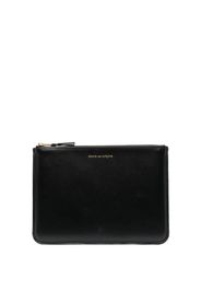 Comme Des Garçons Wallet Portafoglio con logo inciso in pelle - Nero