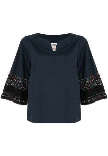 Blusa con ricamo