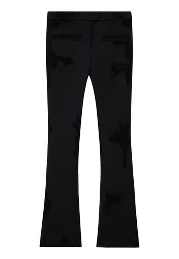 Courrèges distressed-effect flared trousers - Nero