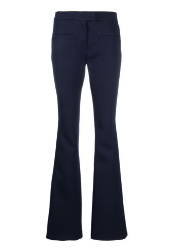 Courrèges logo-patch flared trousers - Blu