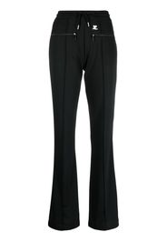 Courrèges logo-patch drawstring flared trousers - Nero