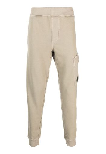 C.P. Company logo-plaque cotton track pants - Toni neutri