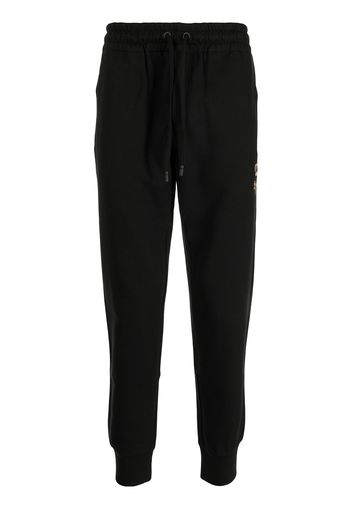 Dolce & Gabbana crest-embroidered track pants - Nero